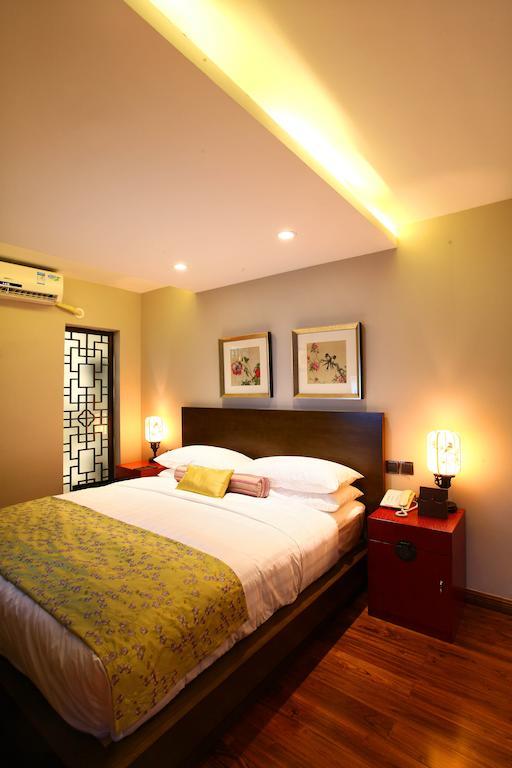 Renli Hotel Чънду Стая снимка