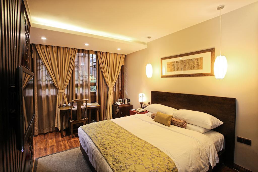 Renli Hotel Чънду Стая снимка