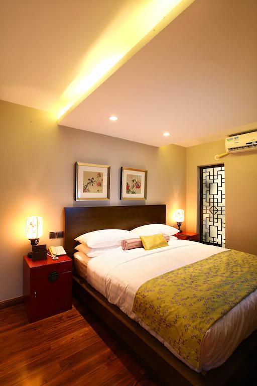 Renli Hotel Чънду Стая снимка